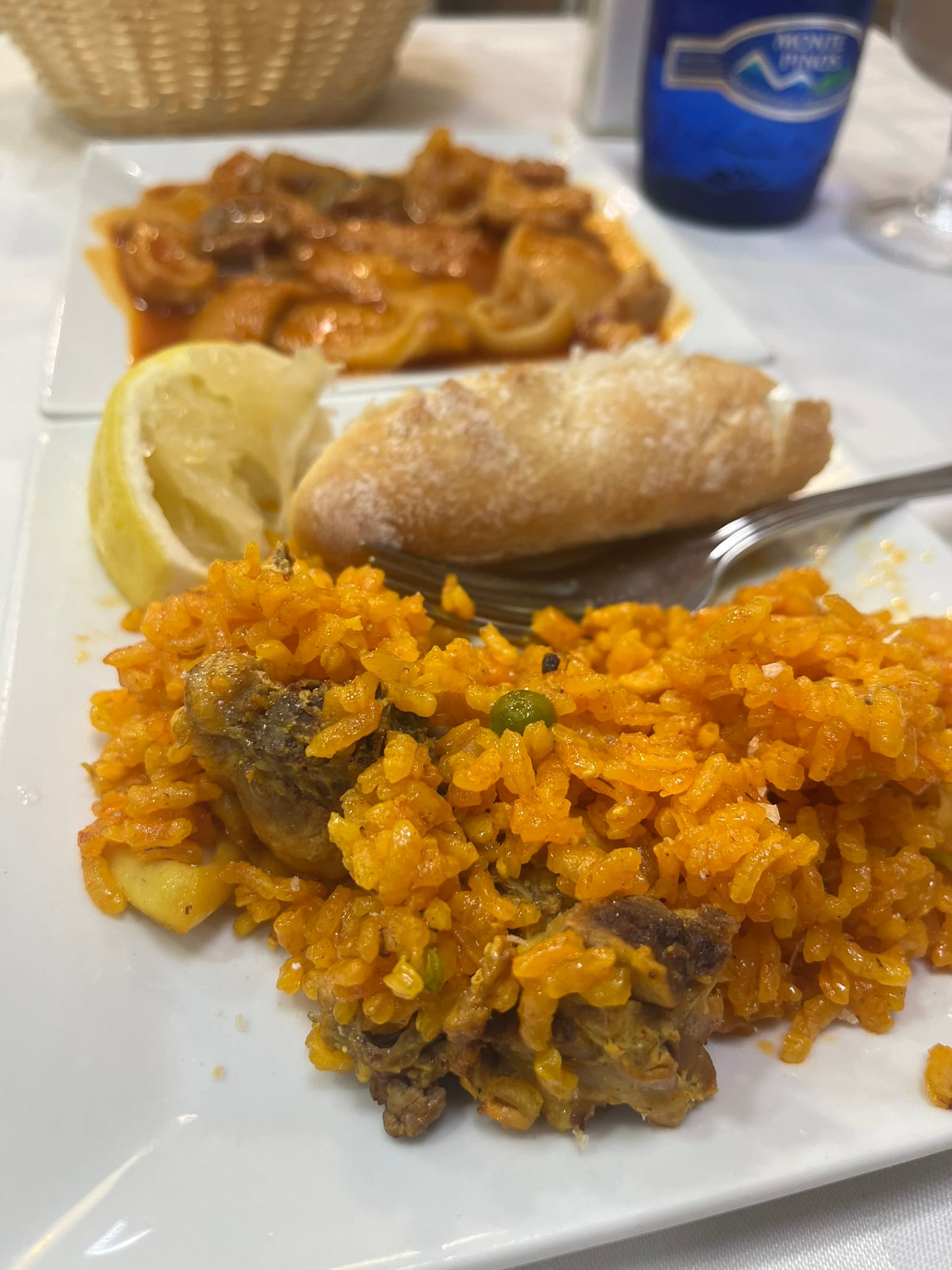 paella, callos (ox stew), lemon, bread